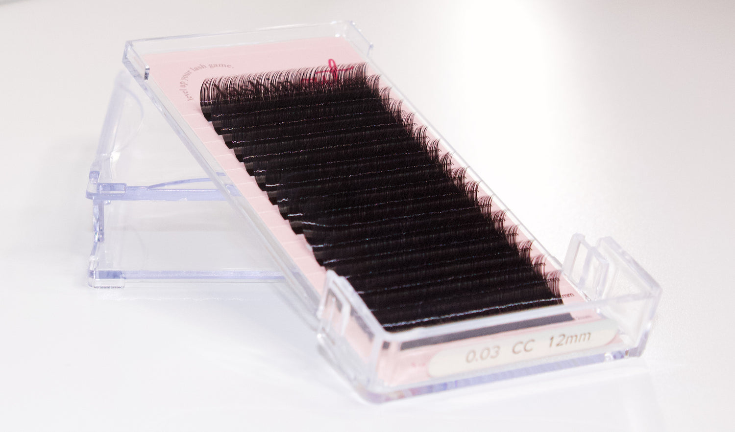 Upright tray of volume lash extensions. The length and curl of the lashes is clearly seen