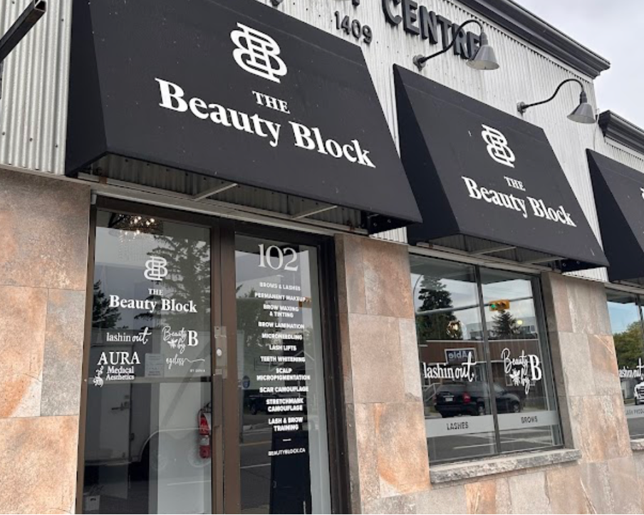Storefront with 'The Beauty Block' and lashin out on the window.