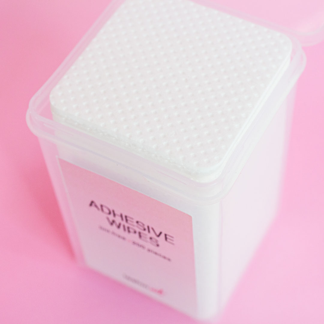 Top view of open Adhesive Wipes.
