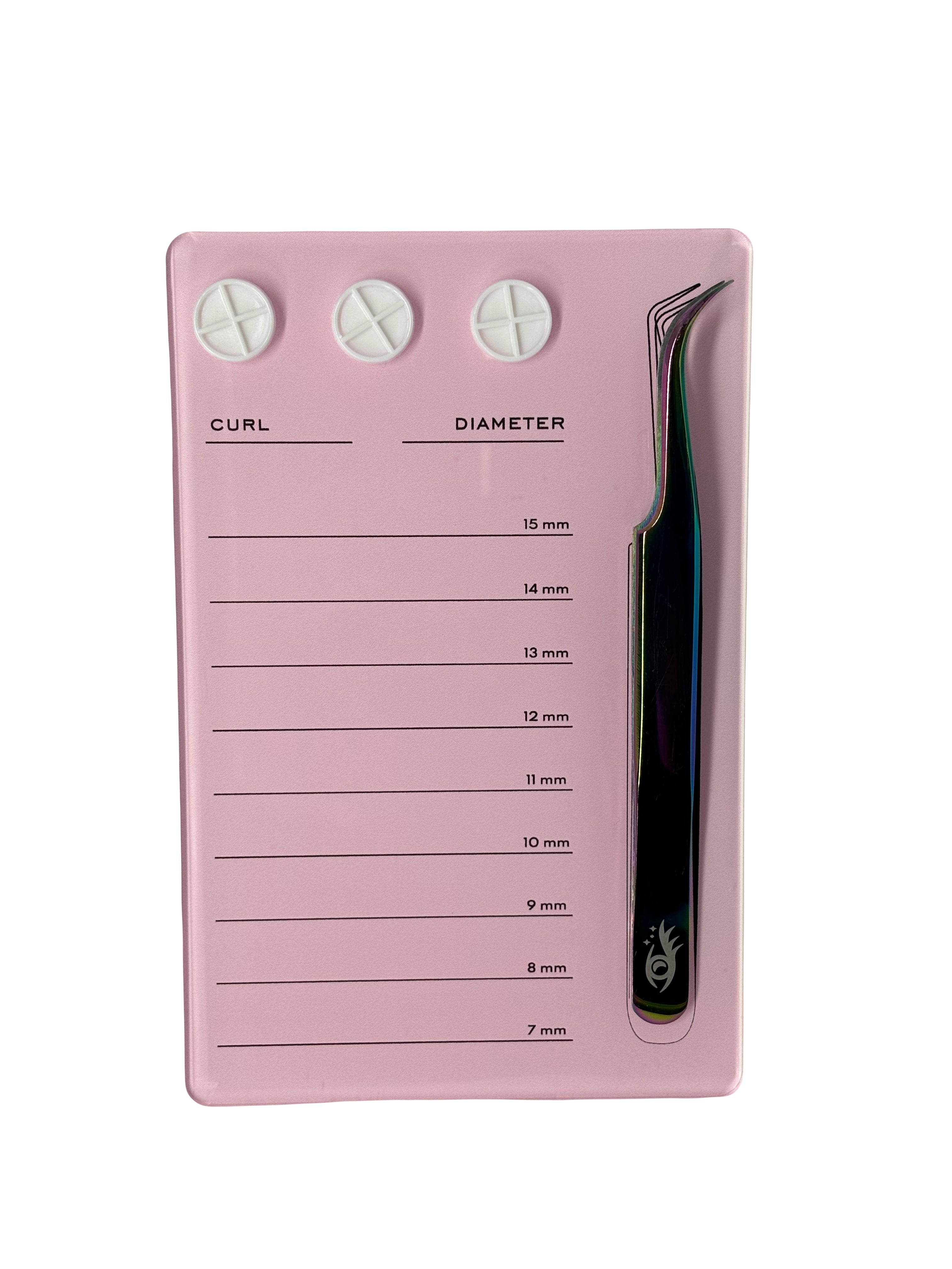 A pink lash tile with three white glue cupholders at the top. Below the cup holders are the words Curl and Diameter.  On the side, there is a set of tweezers attached by two magnets. There are 9 horizontal lines going down the tile that indicate different millimetres to organize lash strips. 