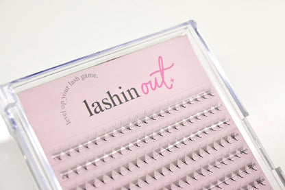 A tray of premade lash fans. You can see 7 rows of premade lash fans. There are 20 premade fans in each row. The text says &quot;Level up your lash game. Lashin Out.&quot;