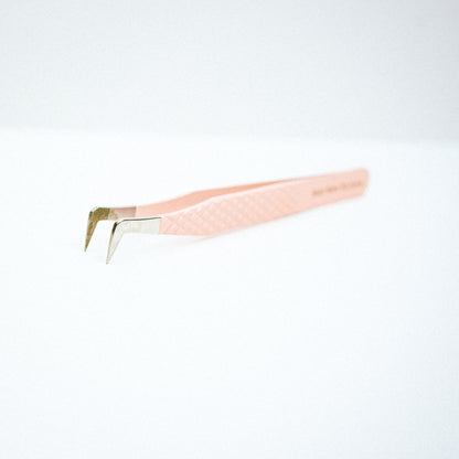 Front view of Boot Blush Nano Tip Lash Tweezer. The tips are at a 45 degree angle and pointing down. 