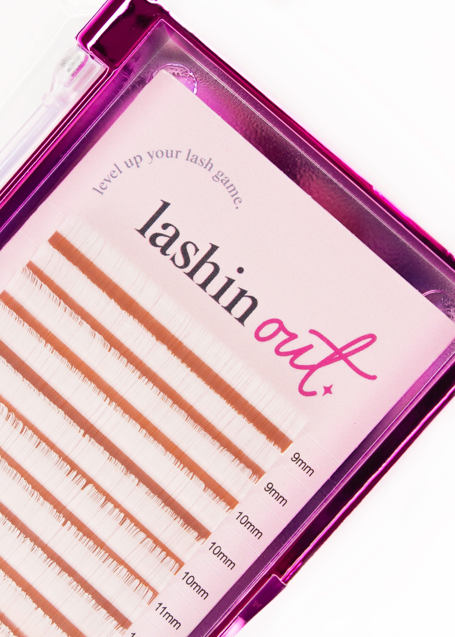 Top view of white lash extensions. The words &