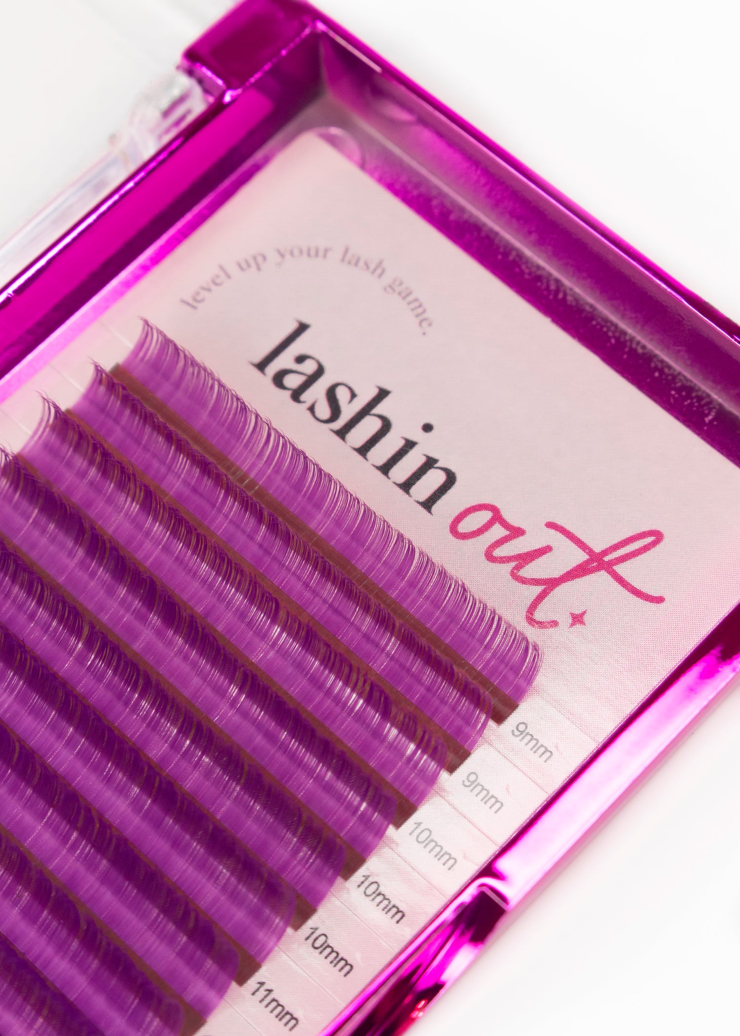 A tray of purple lash extensions. There are two strips of 9mm, 3 strips of 10 mm and one strip of 11mm is shown. 