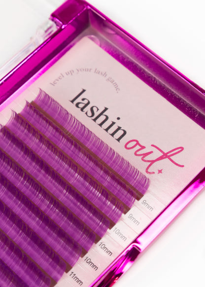 A tray of purple lash extensions. There are two strips of 9mm, 3 strips of 10 mm and one strip of 11mm is shown. 