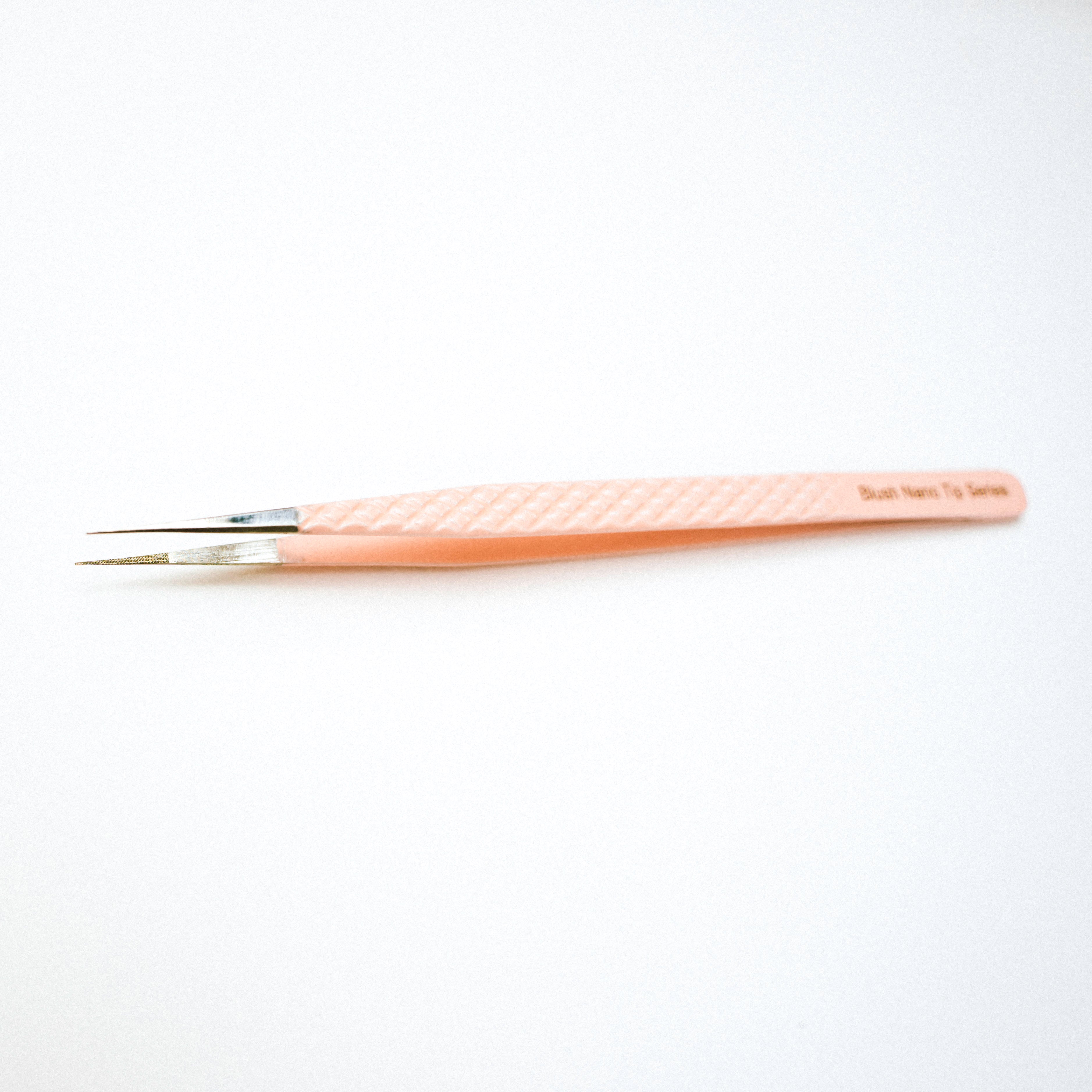 Top view of the Slim Blush Nano Tip Lash Tweezer. 