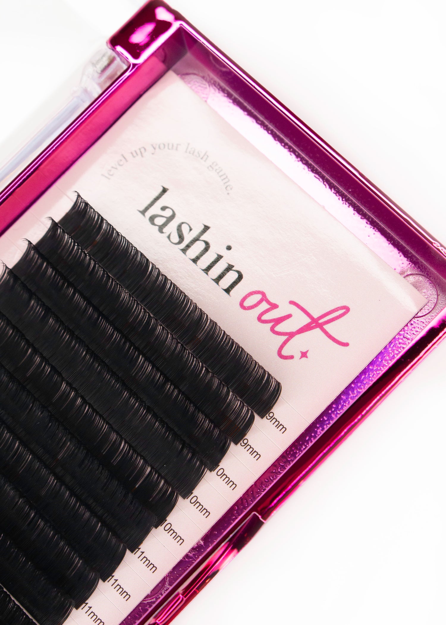 Pink tray of volume lash extensions. The tray says &